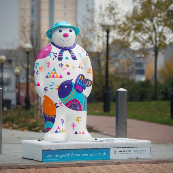 Walking with the Snowman Sculpture